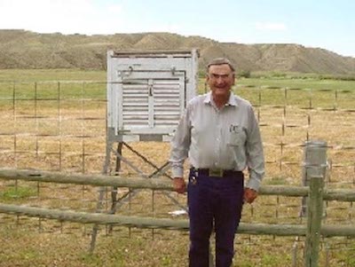 NWS COOP observer Jim Wood and his instrument shelter at Loma, Montana 